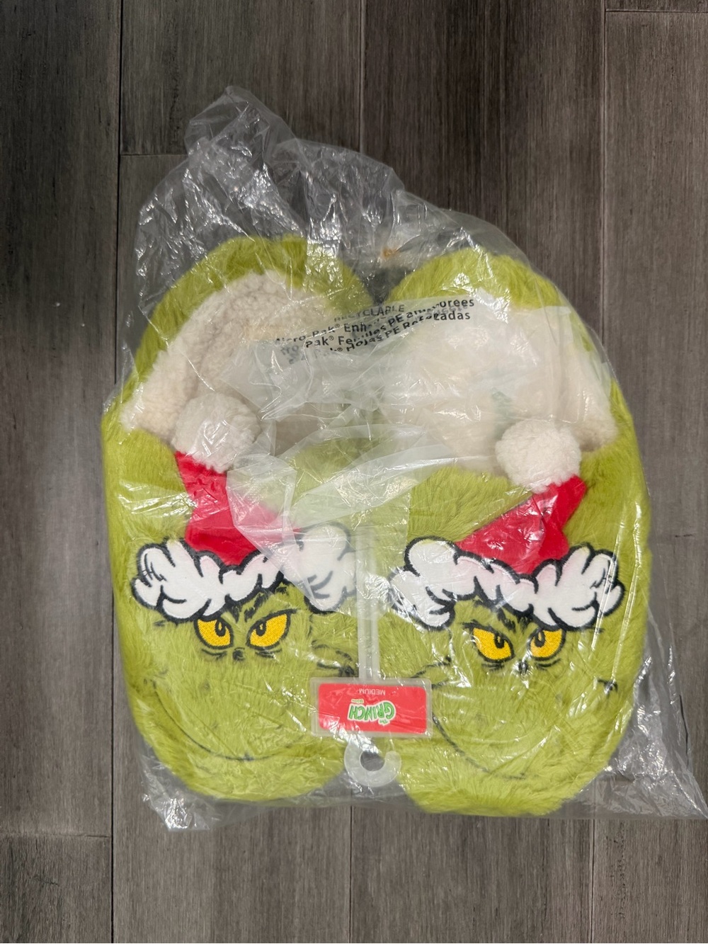 Green The Grinch Plush Holiday Slippers with Festive Red Hat Detail